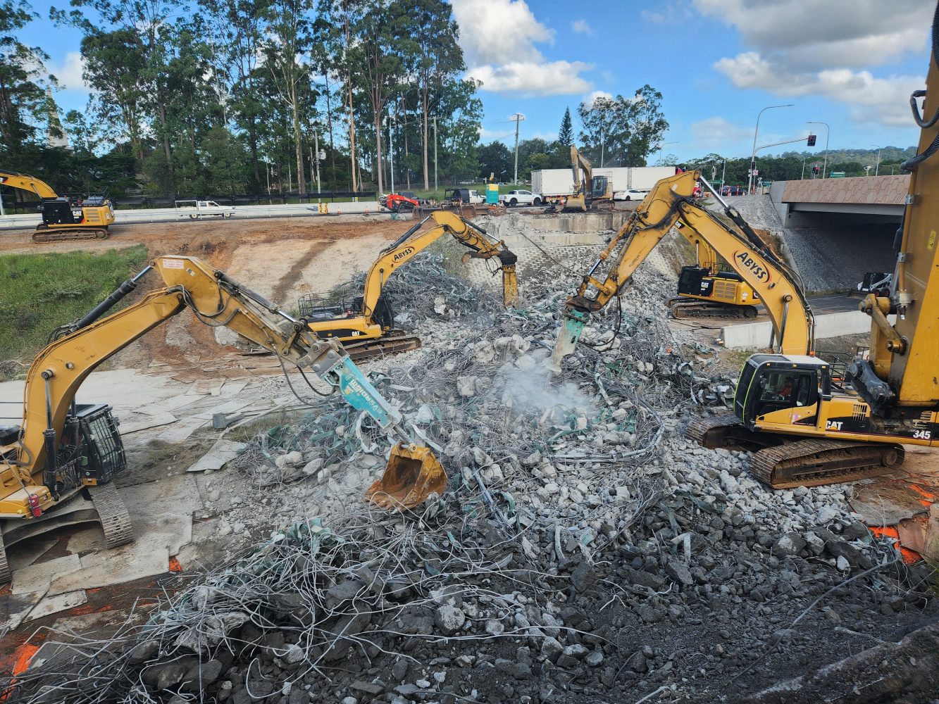 Excavators processing material into separate waste streams to maximise recyclability.