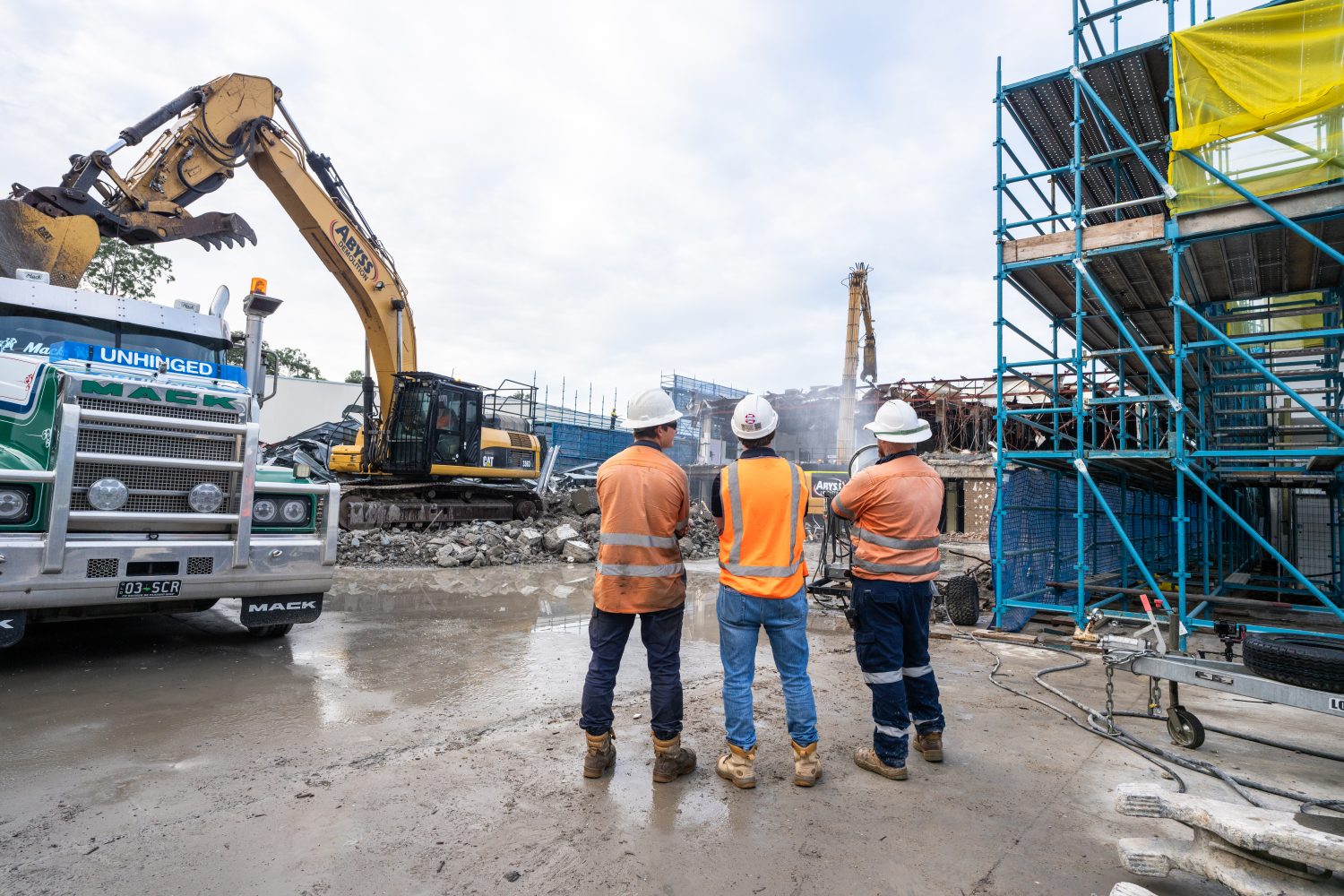 Demolition in progress with Project Management team
