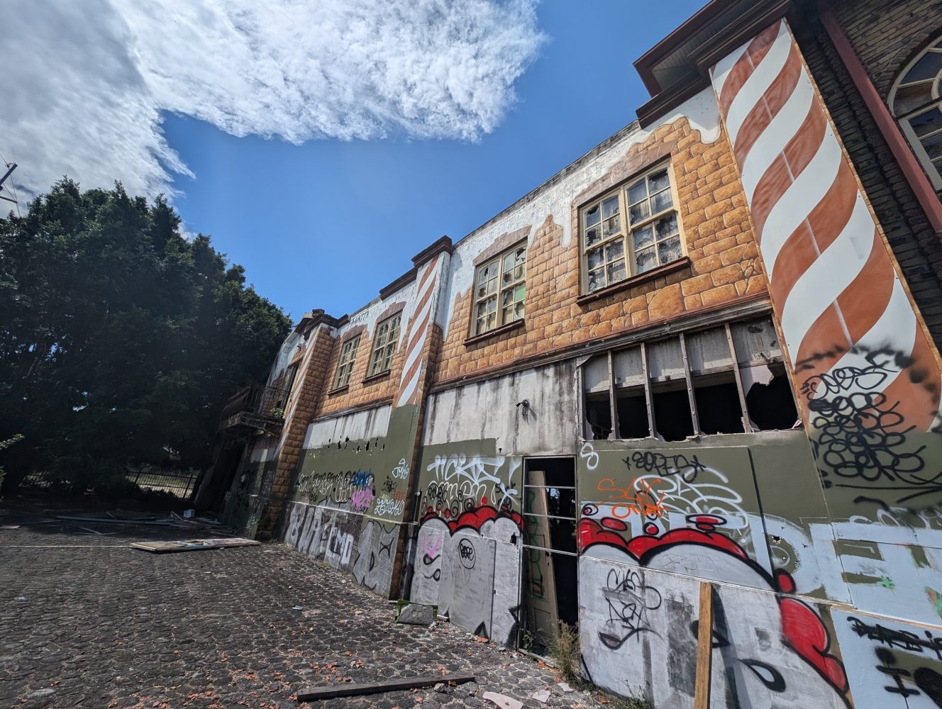 demolition of Antique Styles building in Loganholme