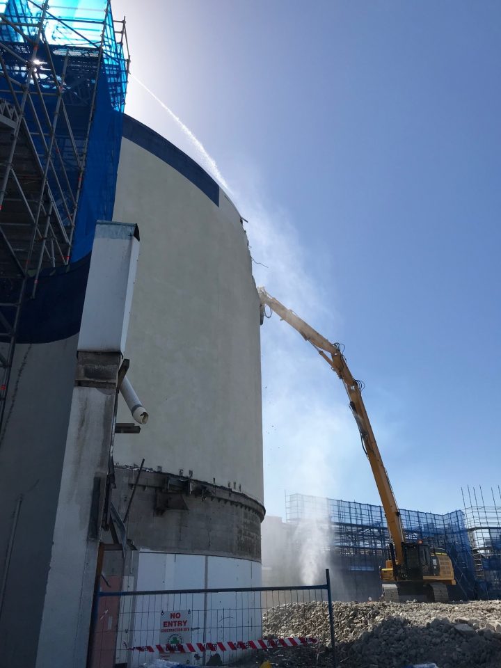 reef hq demolition using high reach excavator